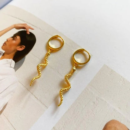 Snakey øreringe guld