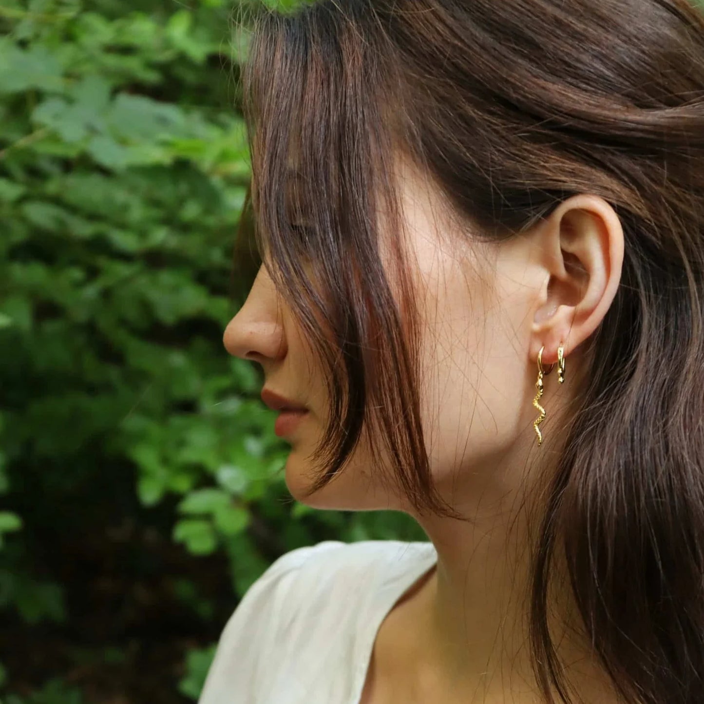 Snakey øreringe guld