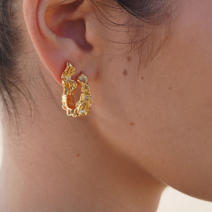 Muslas øreringe – Guld